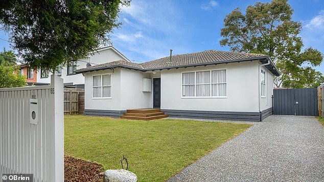Saving for a house deposit now takes more than 15 years - even if someone puts away almost $400 a month (pictured is a house in Melbourne's Frankston North)