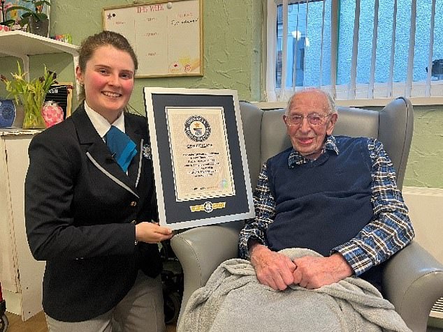 John Alfred Tinniswood received a 'surprise visit' from Guinness World Records at the Hollies Rest Home in Southport, Merseyside, on Thursday