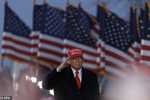 Former US President Donald Trump arrives at a rally in Schnecksville, Pennsylvania