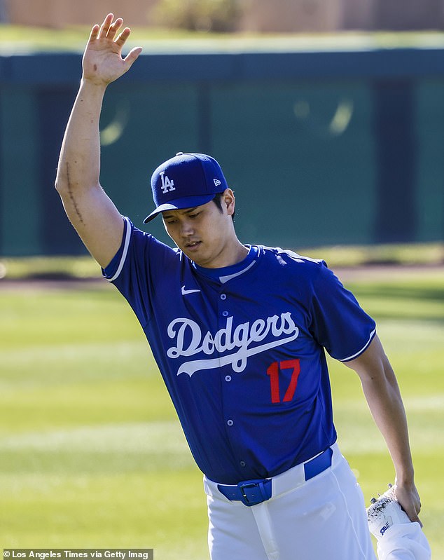 Shohei Ohtani's right arm bears a scar after his second Tommy John surgery