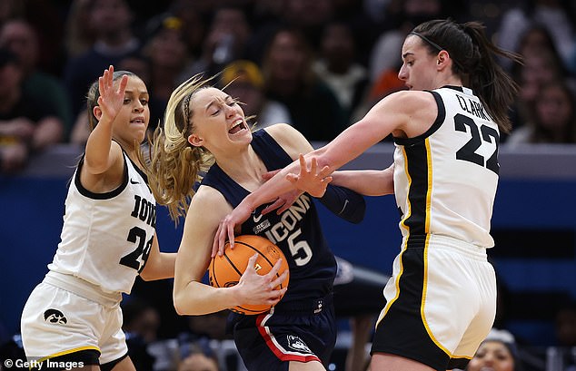 A peak of 17.3 million tuned in to watch Paige Bueckers (center) and Caitlin Clark (right)