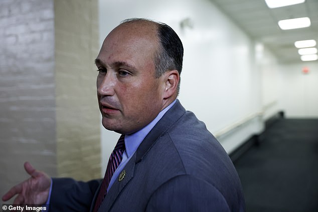 Representative Nicholas Langworthy (R-NY) speaks to reporters as he walks to the House Republican Conference meeting at the US Capitol Building on July 18, 2023