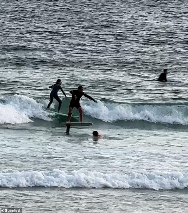 A hydrofoil was confronted at Bondi Beach in Sydney, where the sport is banned