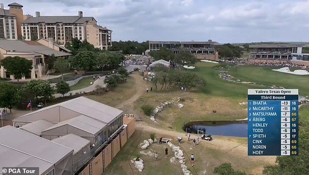 Spieth steered his ball away from the green (top, center) and toward the clubhouse (left)