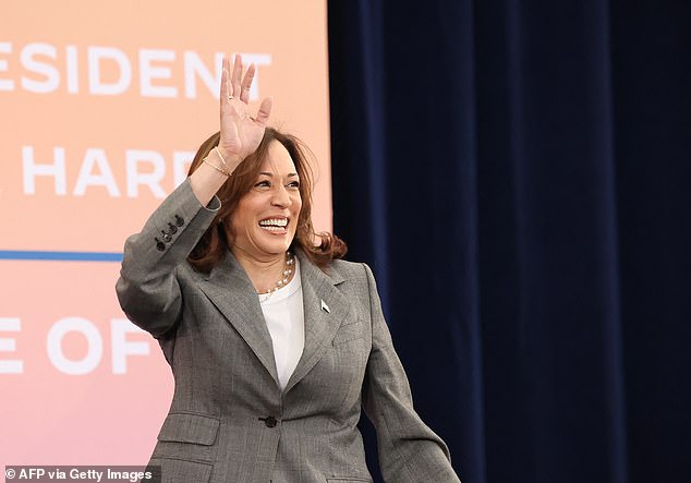 US Vice President Kamala Harris waves as he attends a lecture in Las Vegas