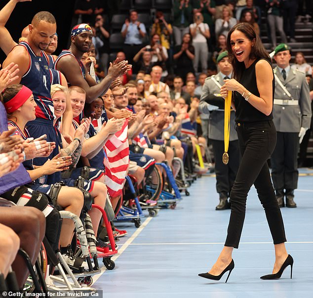 The Duchess wore very high stiletto heels as she presented medals to the winning US wheelchair basketball team at the Invictus Games in Frankfurt last year