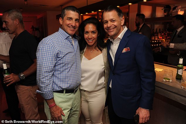 Catherine Tusiani, 50, died Wednesday after a tree crushed her car on Route 128 in Armonk.  Her husband, Michael J. Tusiani (right), is senior vice president of partnerships for the Yankees