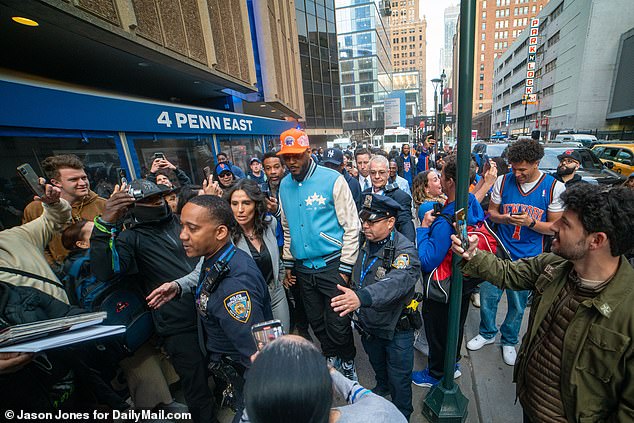 Carmelo Anthony was swarmed by fans as he entered Madison Square Garden for the match