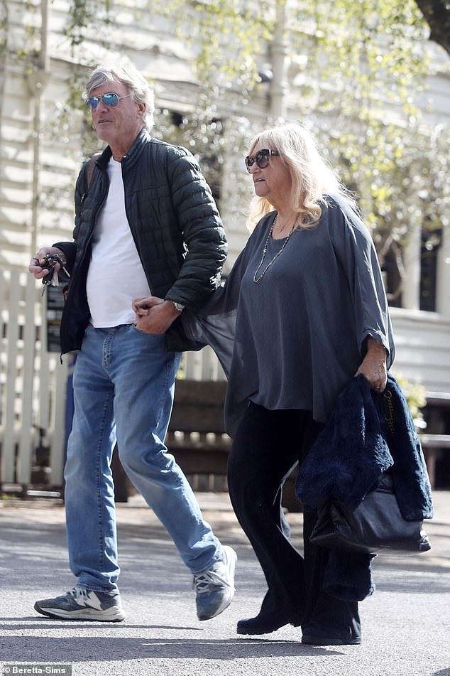 The TV personality, 75, walked hand in hand with her husband of 37 years as they arrived together at the north London pub on Monday afternoon