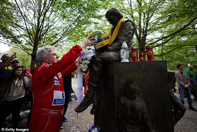 A replica of Senna's iconic helmet was placed by a fan on the monument dedicated to him