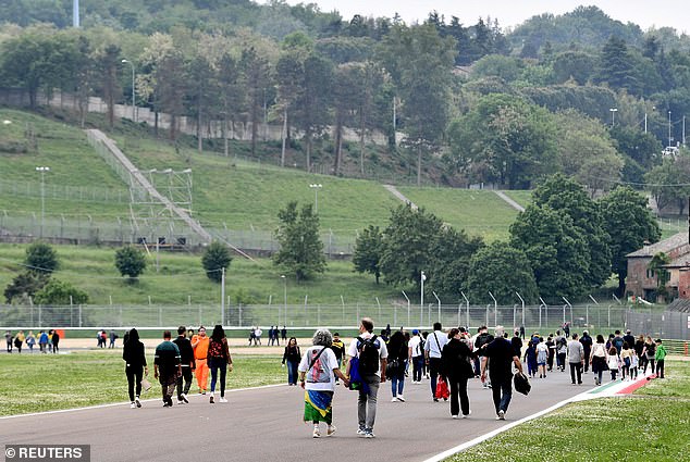 A number went to the circuit where Senna died just 24 hours after the death of fellow driver Roland Ratzenberger