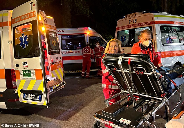 Children are unloaded from ambulances after arriving in Trieste, Italy, April 30, 2024