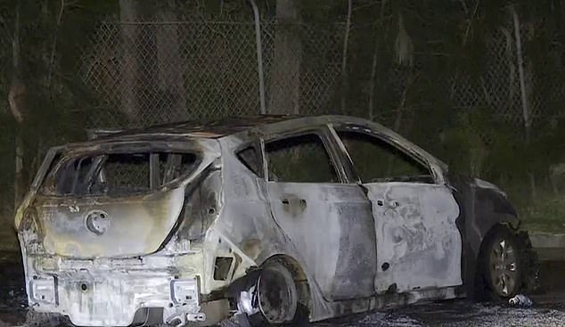 A burnt-out Hyundai hatchback was discovered in Bass Hill, about 6 miles from Merrylands, where a family of six were targeted in a suspected drive-by shooting on Tuesday evening.