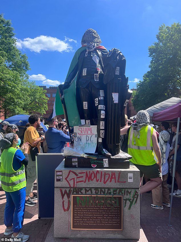 Students painted the historic Washington statue and added a new name for GWU on the pedestal: 'Genocidal Warongering University'