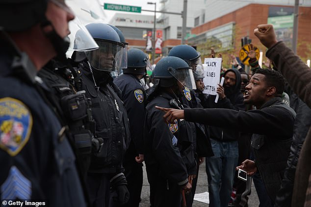 Gray's death sparked riots and looting across Baltimore, injuring 113 police officers and arresting 486 people, as critics claimed Mosby caved to pressure to falsely file charges.