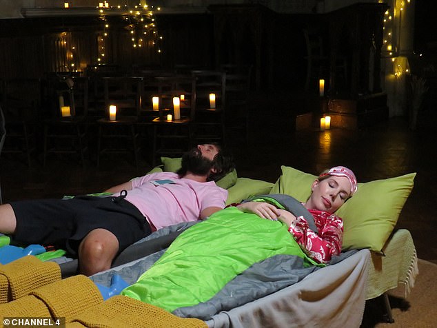 Joe and Katherine in bed, Champing [church glamping] at St. Michael the Archangel, Booton in Norfolk, near Norwich