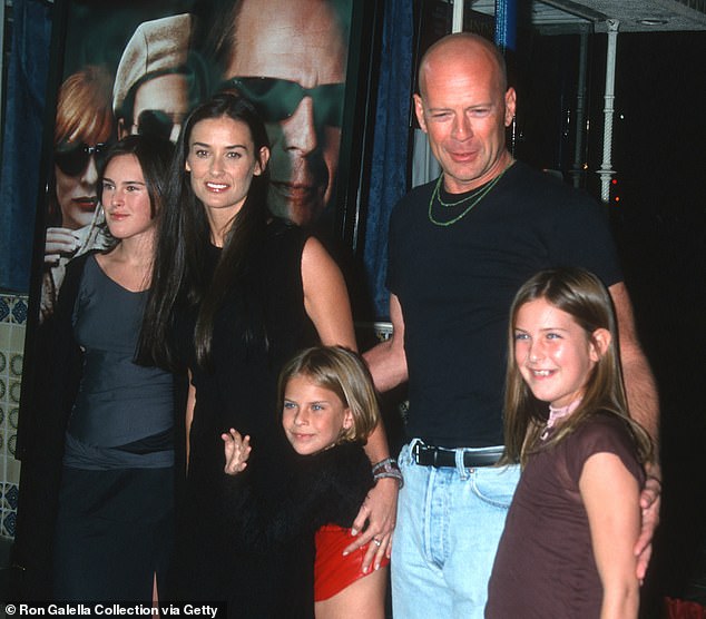 The Willis family has remained extremely close despite Demi and Bruce's divorce in 2000 after 13 years of marriage;  seen in 2001
