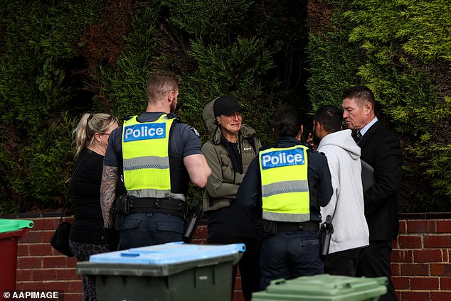 Police at the house where Lindemann committed his horrible crime