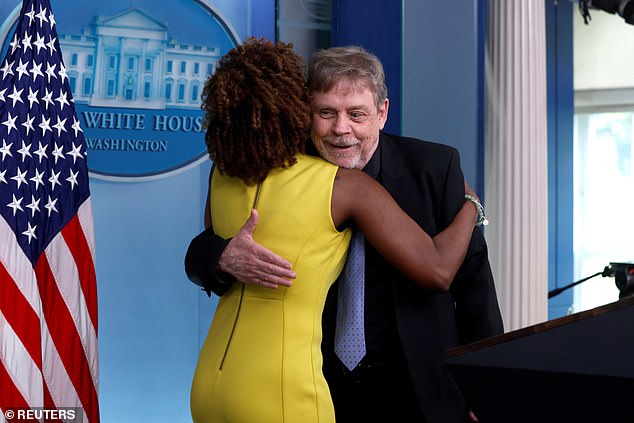 Mark Hamill (right) gave White House Press Secretary Karine Jean-Pierre (left) a hug as he left the White House briefing room Friday afternoon