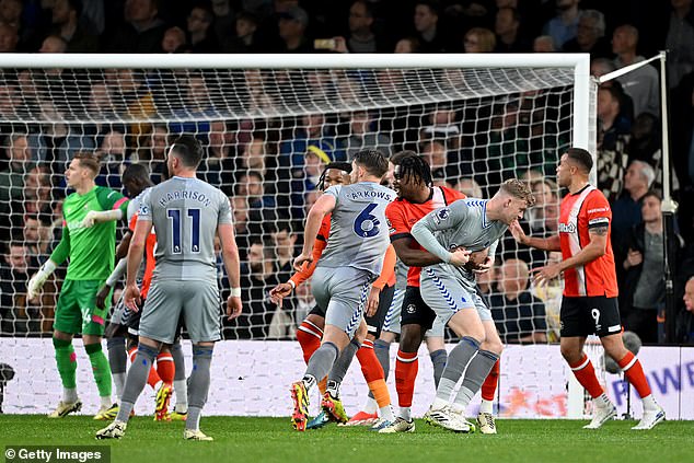 Luton defender Teden Mengi (centre) was penalized for holding Everton player Jarrad Branthwaite