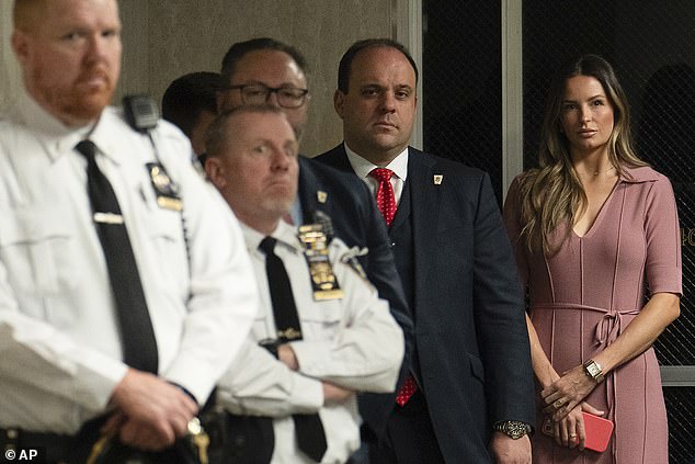 Press aide Margo Martin (far right) and legal advisor Boris Epshteyn (center) accompanied Trump to court on Friday.  Campaign consultant Jason Miller is being embezzled by court officials