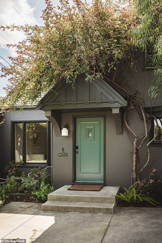 The front of the house has a charming courtyard leading to the front entrance