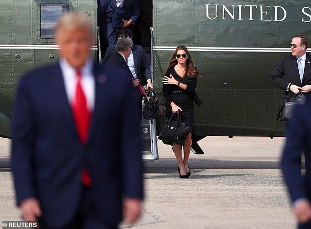 White House Advisor to the President Hope Hicks walks off Marine One before boarding Air Force One as she leaves Washington with US President Donald Trump for campaign trips to Florida at Joint Base Andrews, Maryland, US, October 23, 2020