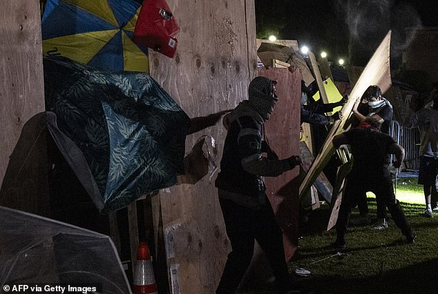 Counter-protesters attack a pro-Palestinian encampment set up on the campus of the University of California, Los Angeles