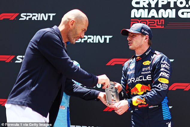 Football legend Zinedine Zidane arrived earlier in the day to present Max Verstappen with his prize for winning the sprint race