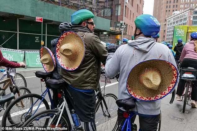 Three bikers wore sombreros on their backs as they took part in the Five Boro Bike Tour in New York City on Sunday