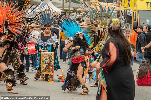 In Santa Monica, Venice's Cinco de Mayo Parade Festival kicked off as dancers dressed in feathers and long skirts took to the streets and celebrated the holiday