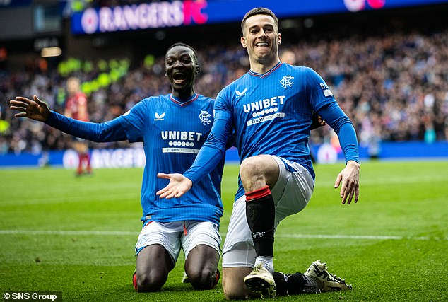 Tom Lawrence celebrates his miracle strike with Mohamed Diomande