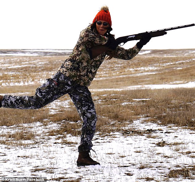 A Facebook photo shows South Dakota Governor Kristi Noem holding a gun.  In her upcoming book, she writes about Cricket, a 14-month-old wirehaired pointer, who Noem shot and killed in the gravel pit on her family's property just before her children came home from school.