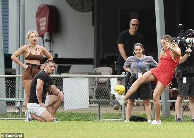 Charlotte, who has joined the Aussie series after leaving Geordie Shore, took to the field in a skimpy red dress