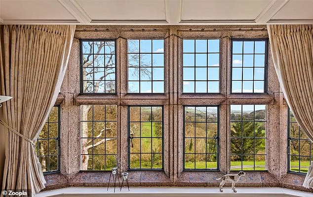 The property has many original features including highly decorative windows