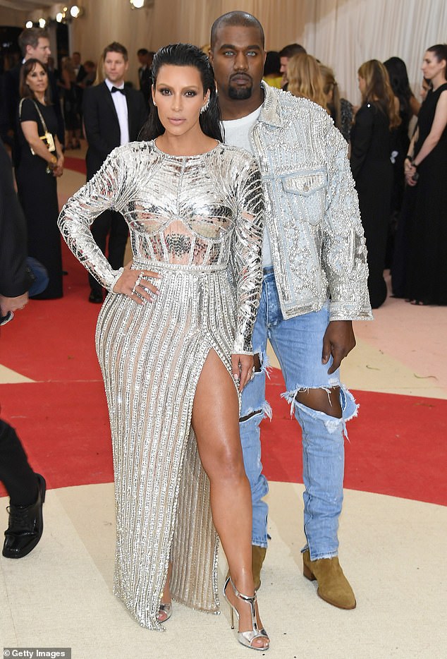 Kim and Kanye's penultimate Met Gala in 2016 saw them matching in metallic silver, with Kanye wearing a particularly striking, dazzling jacket