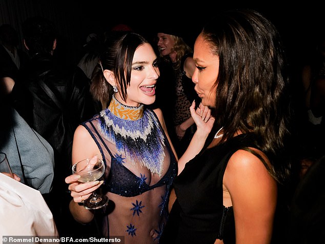 Emily seemed in good spirits as she sipped Clase Azula at the party