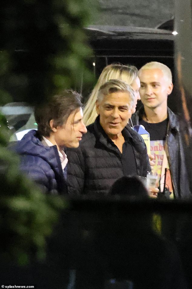 George was seen talking to cast and crew members on his birthday