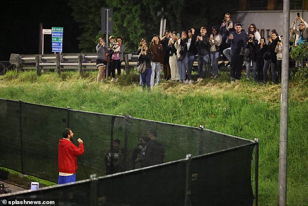 Fans were seen waiting to take a photo of Adam as he took a break from filming;  he was also chatting with some fans