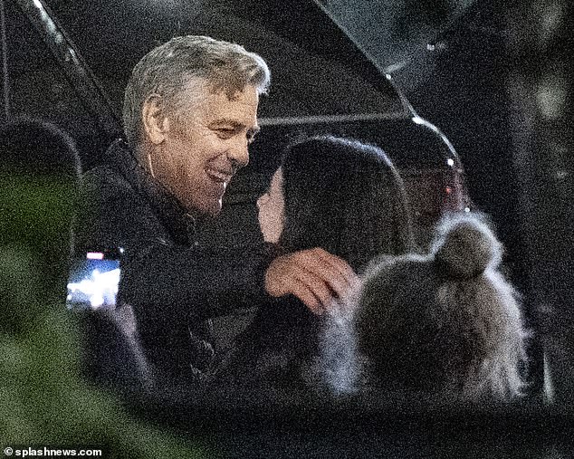 George was seen hugging a crew member on set on his birthday