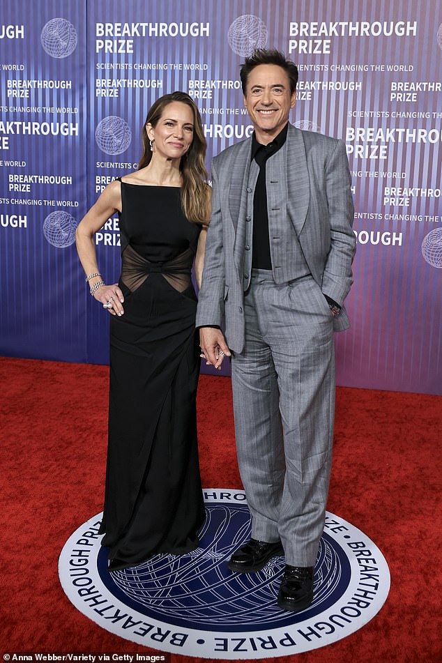 The former Brat Packer also serves as executive producer of McNeal along with his wife of 18 years – Susan Levin Downey (L) – who co-founded their production company Team Downey a decade ago.