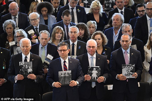 President Joe Biden, House Speaker Mike Johnson, House Majority Leader Steve Scalise and House Minority Leader Hakeem Jeffries hold statues of Holocaust victims during the annual Days of Remembrance ceremony for Holocaust survivors at the U.S. Capitol