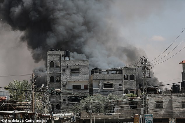 Smoke rises from shopping center after Israeli airstrike on eastern Rafah, Gaza