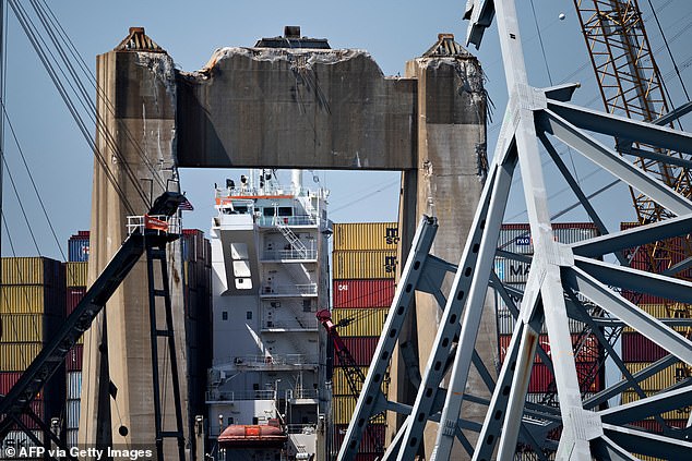 The bridge of the freighter Dali can be seen through the remains of the Key Bridge