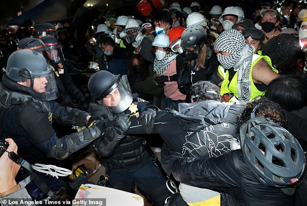 Police clash with pro-Palestinian protesters after a dispersal order was issued at UCLA