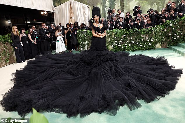 Cardi B won the award for the most unnecessary use of fabric.  She broke the carpet record with a team of ten people preparing her dress for every camera sign.