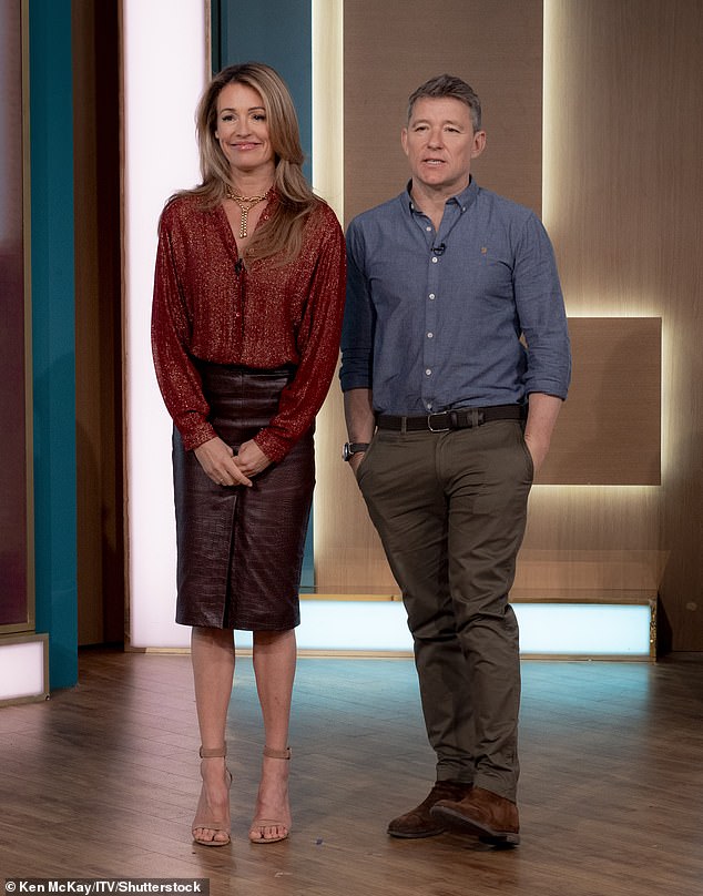 The presenter opted for a sparkling red vintage shirt combined with a brown leather crocodile skirt