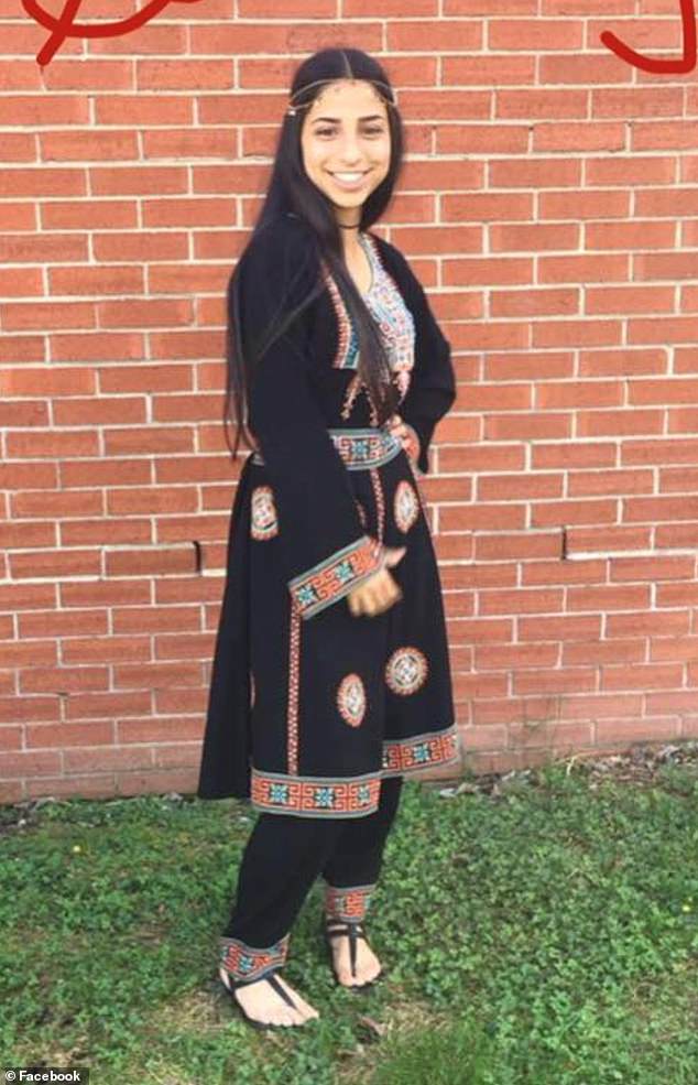 Mobarak in a rare photo without her hijab, in traditional clothing