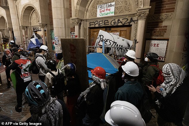 Pro-Palestinian protesters blocked the doors of a UCLA building and occupied it until police were forced to remove the protesters