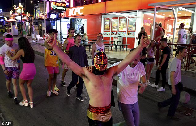 Tourists seen walking on the street in Magaluf